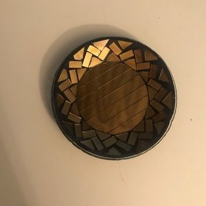 Bronze colored candle holder plate